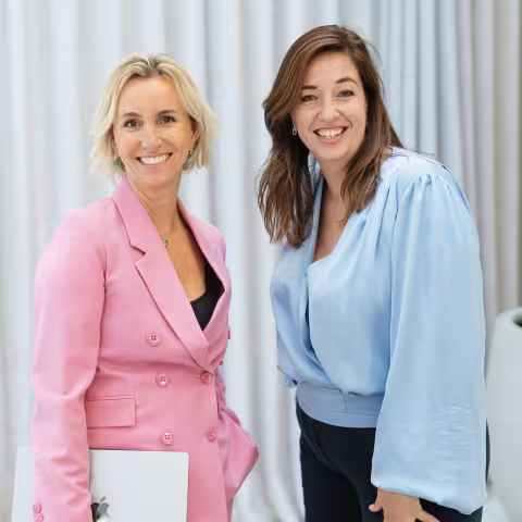 Two woman laughing